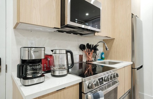 Ukrainian Village Hotel | Spacious 3BR Family Suite I Private Patio I Walk to Everything