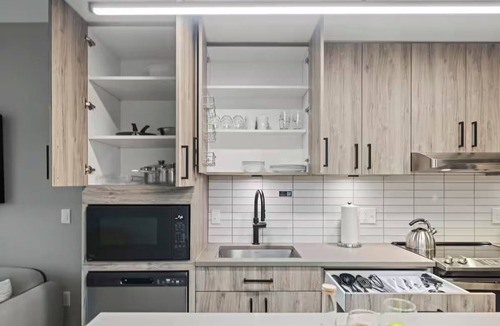 Navy Yard Apartment | Spacious Haven | Kitchen & Desk | DC Stay w/Coworking & Gym | Near Iconic Spots