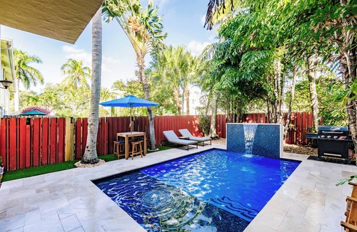 Tarpon River House | Spacious townhouse in downtown with rooftop terrace, heated pool, and king bed
