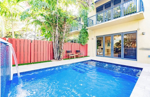 Tarpon River House | Spacious townhouse in downtown with rooftop terrace, heated pool, and king bed