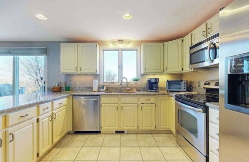 Sagamore Beach House | Spacious wooded retreat near canal & beach with deck & alfresco dining