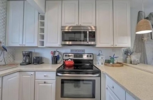 Dewey Beach Condo | Spectacular Sandy Beach & Private Dock Retreat in Charming Dewey Beach- AC/Wifi