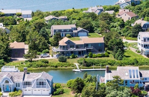West Yarmouth House | Spectacular waterfront home/boat dock/3 private beaches/gated community