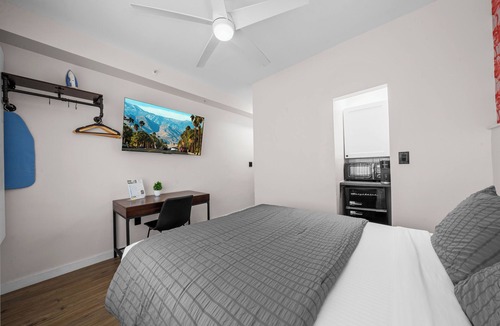 City Center Hotel | Standard Queen Room: Free Beach Chairs, Parking, & more Included