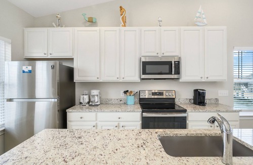 Captain's Cove House | Statuesque waterfront home by Seaside Vacations & Sales