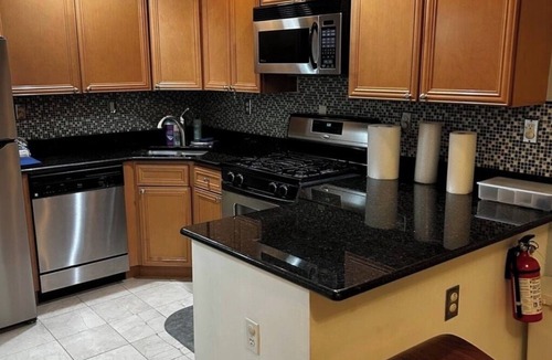 Weehawken Apartment | Stay Just Under 20 Minutes from Times Square - Free 2-Car Garage Parking.