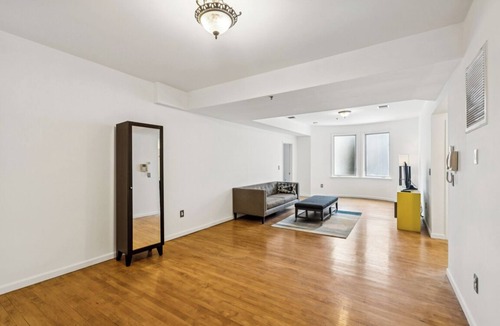Weehawken Apartment | Stay Just Under 20 Minutes from Times Square - Free 2-Car Garage Parking.
