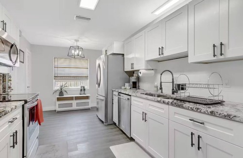 Sandalfoot Cove House | Stunning 4-Bedroom House with Private Saltwater Pool in Sunny South Florida