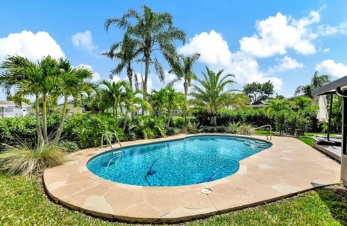 Sandalfoot Cove House | Stunning 4-Bedroom House with Private Saltwater Pool in Sunny South Florida