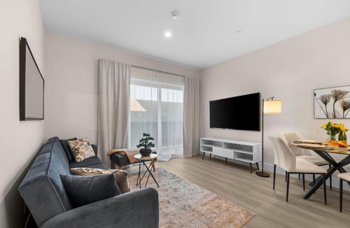 Parkside Apartment | Stylish Condo, Walk to Dining, 5 Min to Beach