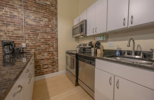 Downtown Boston Apartment | Stylish Exposed Brick 3BR!