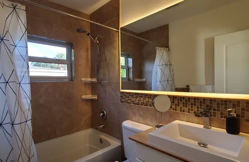 North Miami Beach House | Stylish family escape! Comfortable home featuring a beautiful outdoor area.