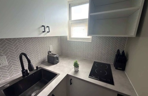 North Beach Apartment | Stylish Newly Renovated Boutique 208–Walk to Beach