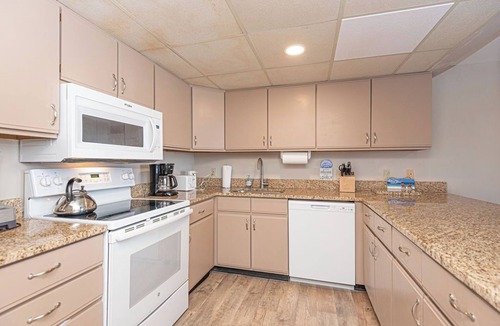 North Ocean City Condo | Stylish, spacious 2 bedroom condo with free WiFi, an indoor pool, and HBO channels located uptown near mini golf and movie theater and only a block to the beach!