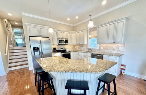 North End Condo | Sunny shore escape—steps to beach, boards & family fun!☀️🌊🏖️