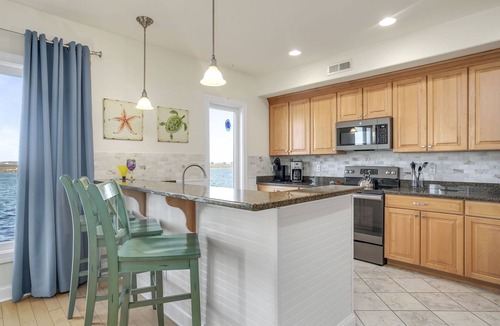 Chincoteague House | Sunset Bay Villa 118 | Waterfront Ground Level + 40' Deep Water Slip + Marina Access + Pool