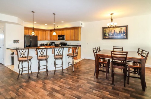Chincoteague House | Sunset Bay Villa 212 | Waterfront Balcony + Pool + Walk to Downtown + Pet Friendly