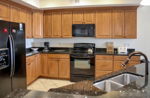 Chincoteague House | Sunset Bay Villa 212 | Waterfront Balcony + Pool + Walk to Downtown + Pet Friendly