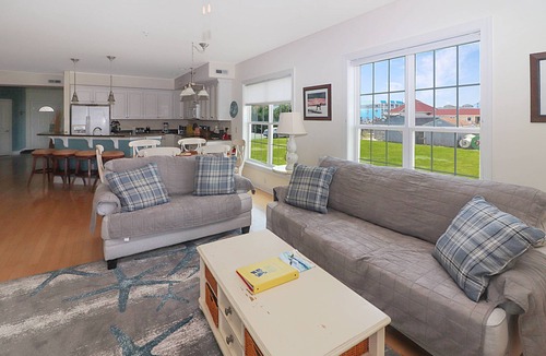 Chincoteague House | Sunset Bay Villa 101 - Waterfront condo w/shared pool!