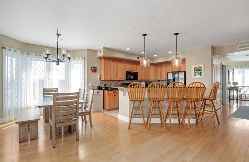 Deep Hole Condo | Sunset Bay Villa 221 | Waterfront Views + King Suites + Pool Access + Balcony Living