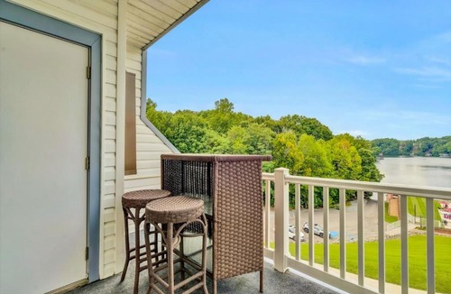 North Shore House | Sunset Landing - Waterfront condo with lake-view deck, tennis court & pool