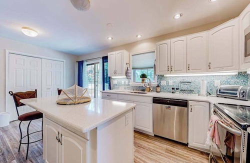 Cedar Neck House | The Reservation - dog-friendly home with fenced yard, deck, grill, & beach gear