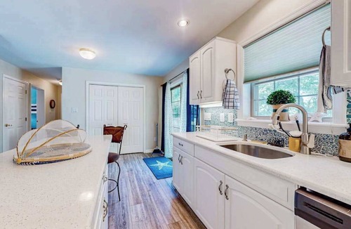 Cedar Neck House | The Reservation - dog-friendly home with fenced yard, deck, grill, & beach gear