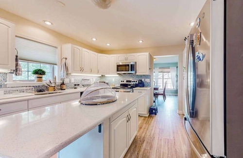 Cedar Neck House | The Reservation - dog-friendly home with fenced yard, deck, grill, & beach gear