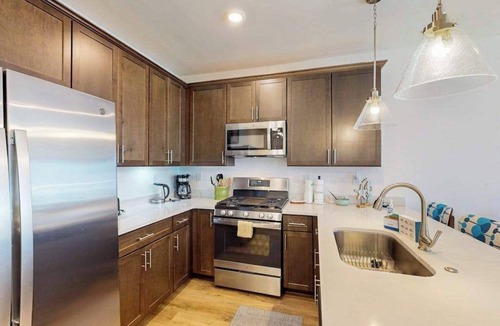 Rehoboth Beach Condo | The Residences at Rehoboth Bay condo w/community pool and patio