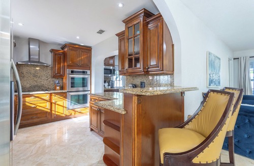 Deerfield Beach House | The Terrace at the cove with with heated pool