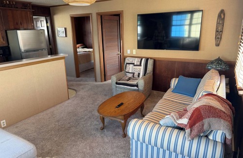 Midtown Ocean City Cottage | This Beach cottage is close to everything and just steps from the Beach !