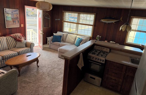 Midtown Ocean City Cottage | This Beach cottage is close to everything and just steps from the Beach !