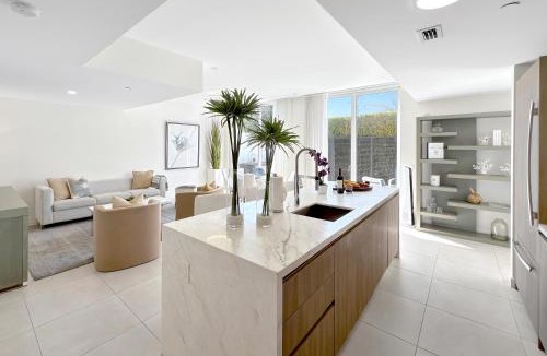 Central Beach House | Tiffany Tides - Resort-Style Beach Townhome - Gym, Rooftop Pool and Sauna