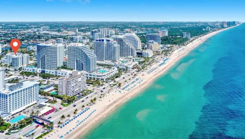 Central Beach House | Tiffany Tides - Resort-Style Beach Townhome - Gym, Rooftop Pool and Sauna