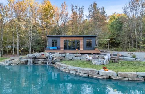 Brackney House | Tiny House on a Waterfall at Private Tiny Lake