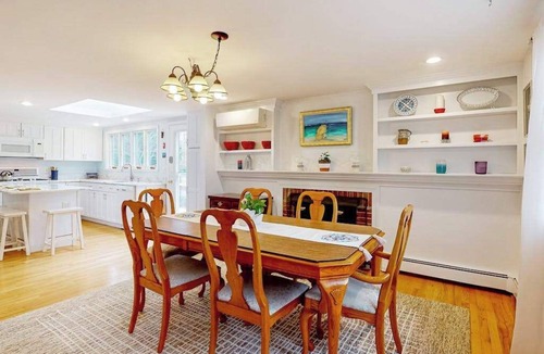 East Orleans House | Tranquil & sunlit home with peaceful yard, large deck, & fireplace - near beach