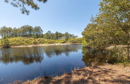 Pine Island House | Tranquility - Pine Island, Lake View, Pets OK, Hot Tub, 2 Community Pools/Tennis/Playground