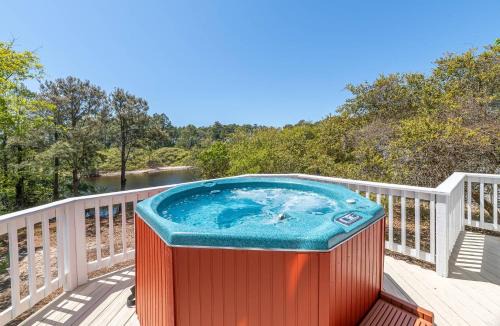 Pine Island House | Tranquility - Pine Island, Lake View, Pets OK, Hot Tub, 2 Community Pools/Tennis/Playground