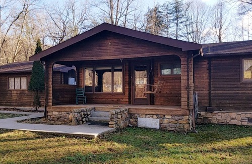Lost River Cottage | Tree swing, Outdoor dining with Stream and Fire Pit, Large Yard, Sunroom, Trail