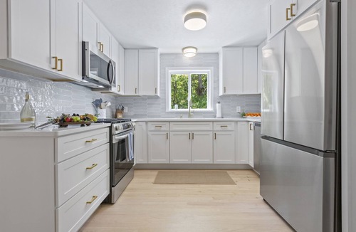 East Falmouth House | Trendy Great Pond Escape! HotTub Open! Sleeps 9!