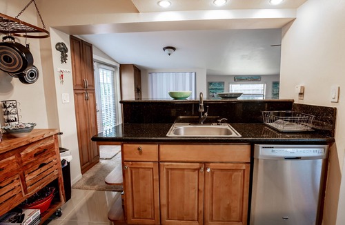 Cypress Point House | Tropical Getaway! Walking distance to beach & dining, private home, heated pool.
