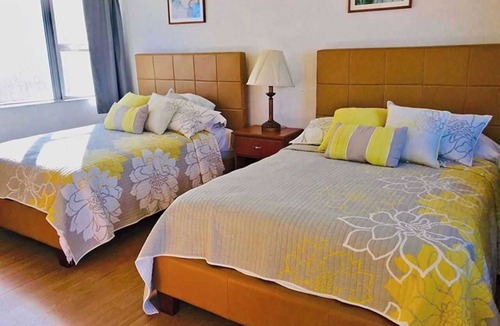 Pompano Beach Hotel | Two double bed studio with full kitchen on 2nd floor .