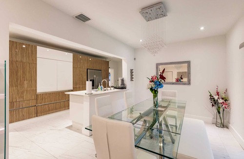 Aventura House | Uhost AI | 5BR Miami | Heated Pool & Water View