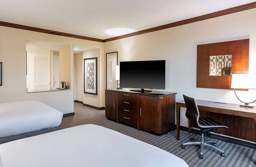 Alexandria West Hotel | Unwind and Indulge In Our Oasis! 2 Swimming Pools, Pet-friendly Property!