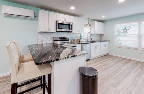 Montego Bay House | Updated dog-friendly home with gas grill, 2 pools, 2 tennis courts, fishing pier