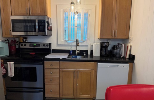 Rehoboth by the Sea Cottage | Vintage Dog-friendly Dewey Beach Cottage - 125 steps to the beach!