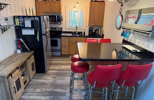 Rehoboth by the Sea Cottage | Vintage Dog-friendly Dewey Beach Cottage - 125 steps to the beach!