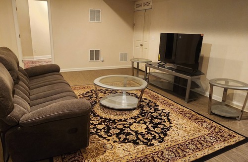 Triangle House | Walk in sunny furnished basement with 2 bedrooms and 2 bathrooms