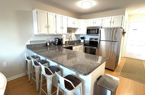 Caine Woods Condo | Walk to Beach Days, Sunset Nights, and Family Fun!, Sleeps 6