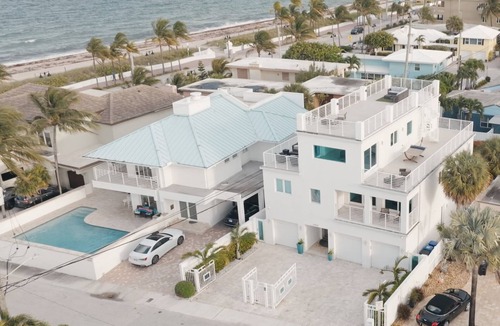 Barrier Island House | Walk to the Beach! 5-bdrm home w/wrap-around deck views for the entire family.